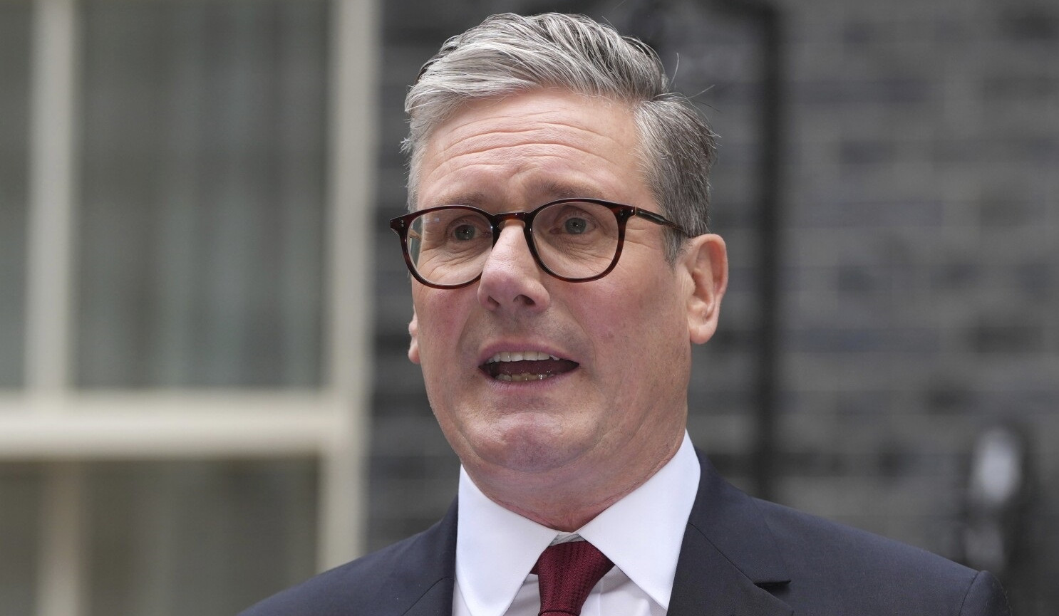 UK PM promises tougher visa rules to fix 'broken' migration system
